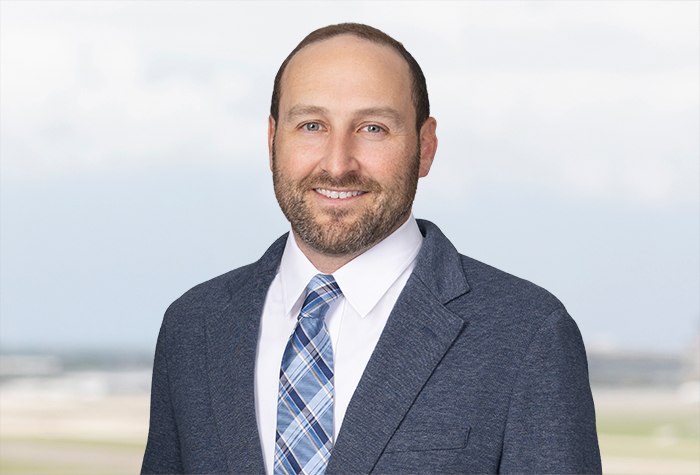 Search Thumbnail for Mike Justus Interviewed in Law360: “Tech's AI Coding Boom on Collision Course With Copyright”